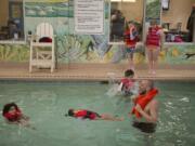 Lacamas Athletic Club Aquatic Director David Crippen, of Vancouver, instructs students on the best methods for floating at Lacamas Athletic Club in Camas. The Club offers free, monthly water safety and swim classes taught by Crippen. The next classes take place March 23, April 27, May 25 and June 22.