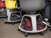 A Union High School student stores his backpack in his chair while in class Tuesday. The east Vancouver high school is testing alternative types of seating. Students say they’re able to focus more easily with the seats.