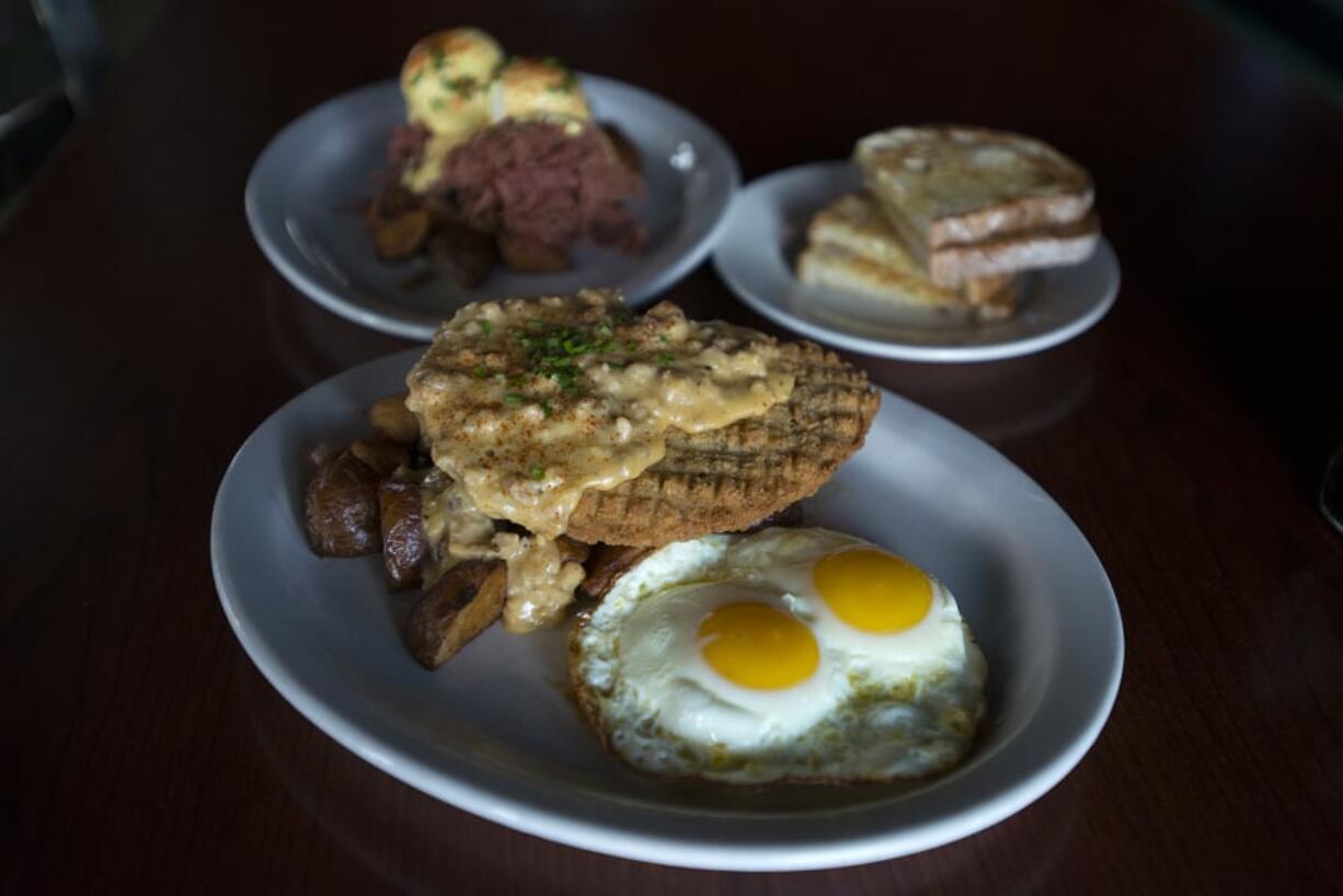 Chicken fried steak is served with corned beef and eggs and toast at Shanahan’s Irish Pub.