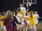 Prairie celebrates their victory over Kamiakin during the 3A Hardwood Classic at the Tacoma Dome on Friday March 1, 2019.