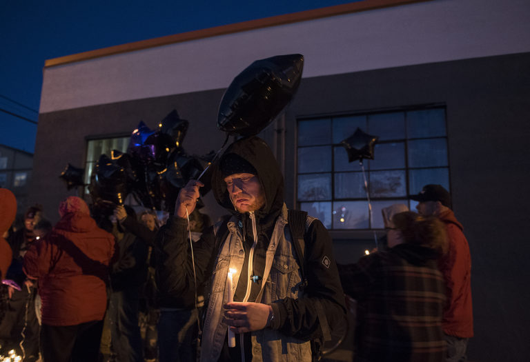 Braedon Buhler of Vancouver, center, gathers with other friends and loved ones of Michael Pierce as they prepare to release balloons in his honor during a candlelight vigil in downtown Vancouver on Friday evening, March 1, 2019. Buhler said he hoped to see more support for people struggling with mental illness, such as Pierce. He also said he remembered Pierce as a loyal friend. "If you were his friend, there's nothing he wouldn't do for you," Buhler said.
