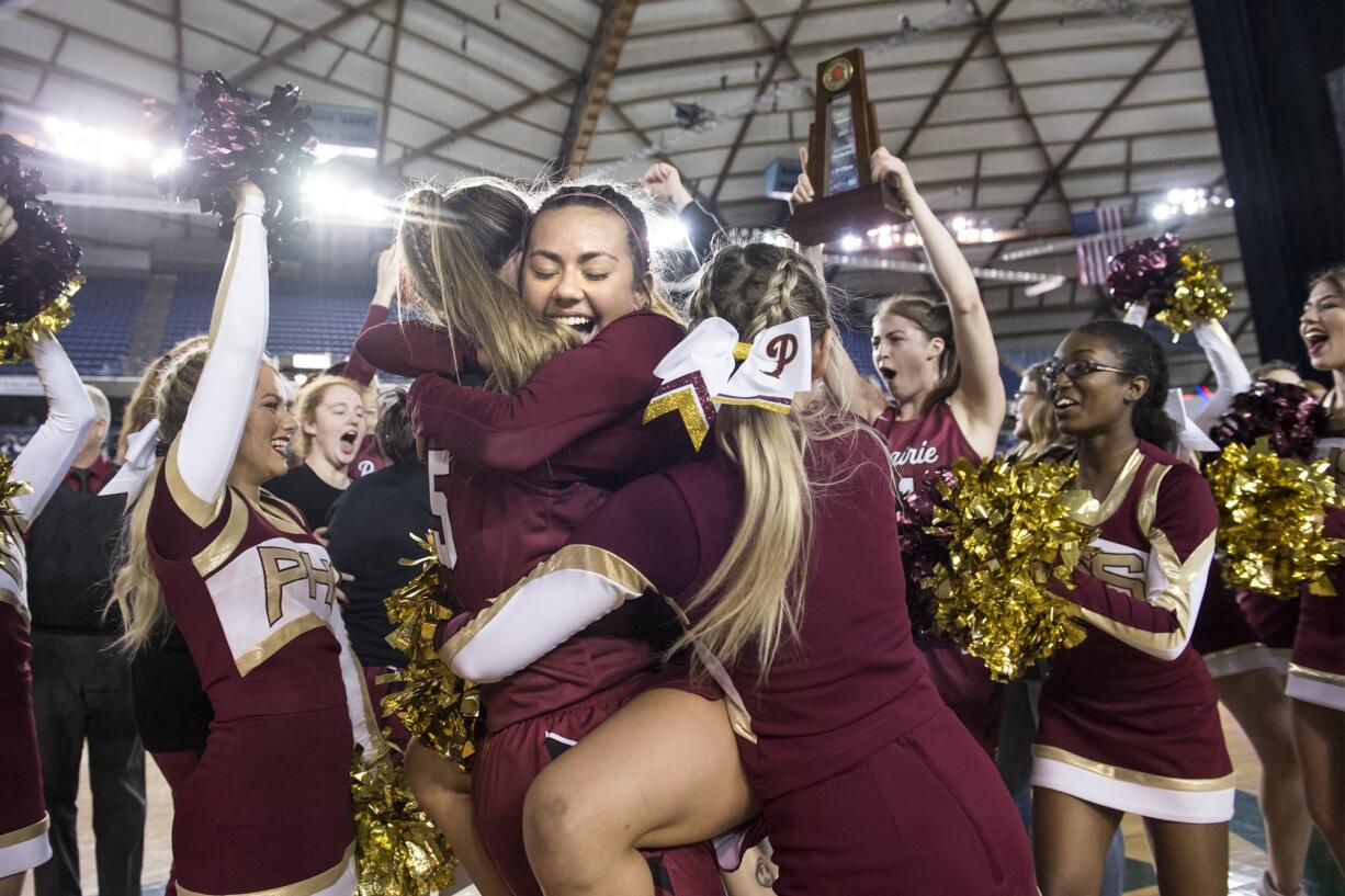 Prairie celebrates their title victory over Mt. Spokane during the 3A Hardwood Classic at the Tacoma Dome on Saturday March 2, 2019.