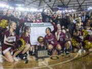 Prairie accepts their trophy following their title victory over Mt. Spokane during the 3A Hardwood Classic at the Tacoma Dome on Saturday March 2, 2019.