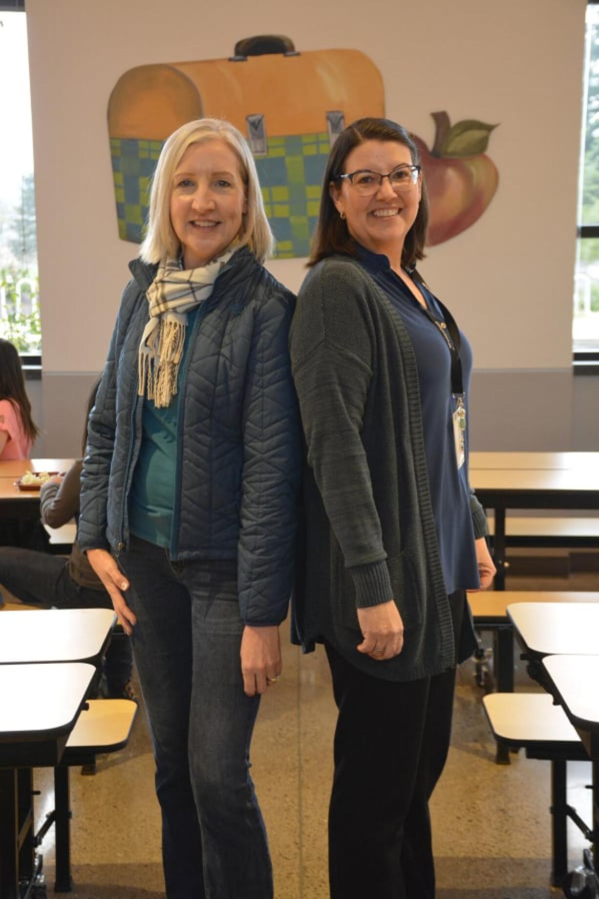 Washuogal: Kim Wongwai, left, and Betty Gabel are two of the first volunteers at Columbia River Gorge’s new Lunch Buddies program.