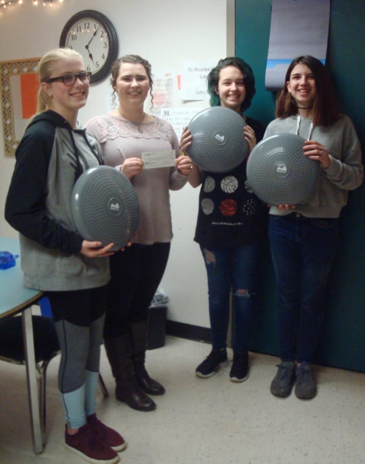 Lincoln: Discovery Middle School students with “wiggle chairs,” which were purchased thanks to a grant from the Lincoln Neighborhood Association.