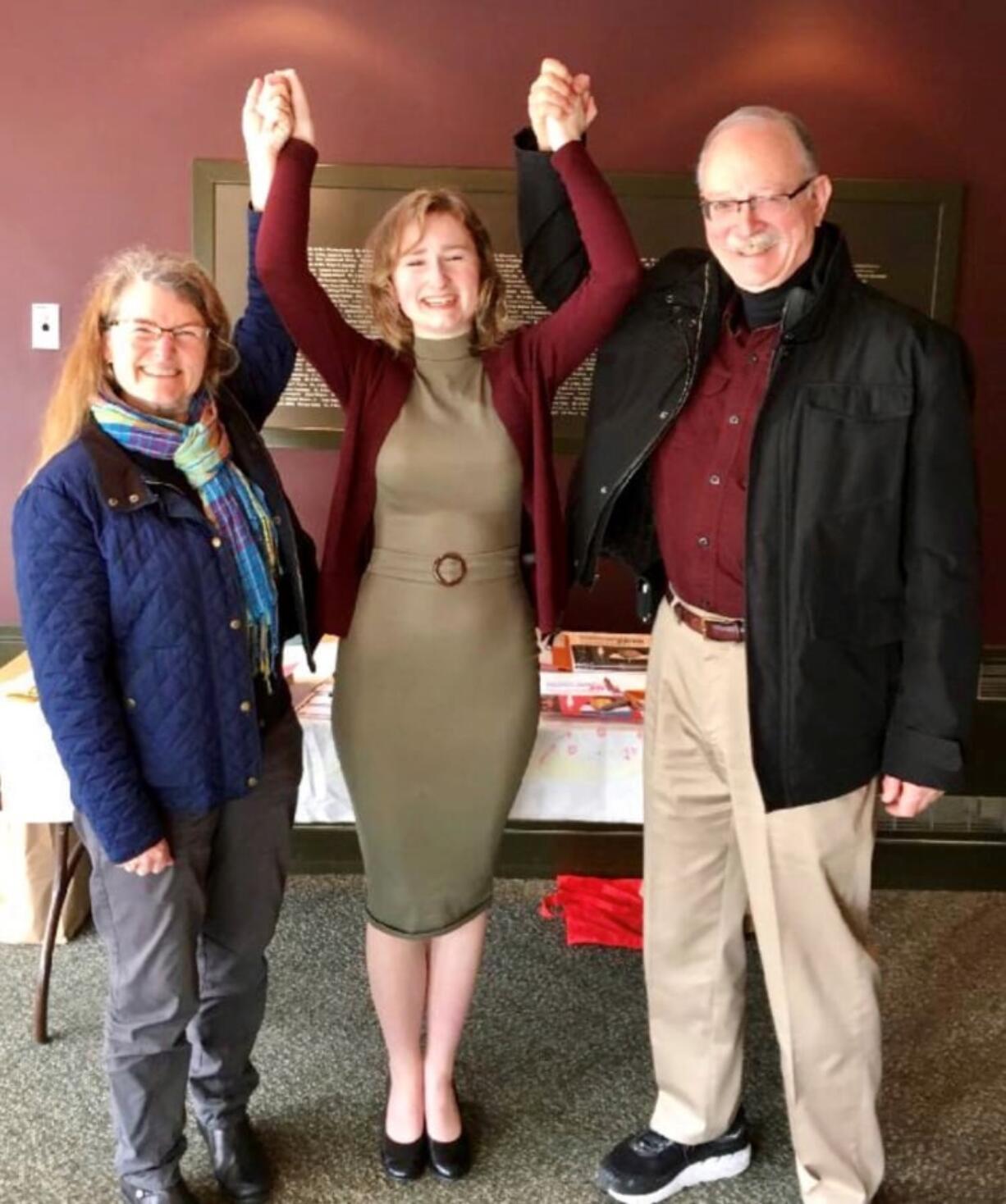 Walnut Grove: Seton Catholic College Preparatory senior Elizabeth Hennessey, middle, with her parents Catherine and Stuart, will represent the region in the 36th annual National Shakespeare Competition in late April. She will travel to New York for the competition.