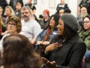 Ophelia Noble, executive director of The Noble Foundation, speaks with Vancouver Police Chief James McElvain about the recent officer-involved shootings and the amount of shootings involving people of color during a Vancouver Neighborhood Alliance meeting Wednesday night at Fisher’s Landing Fire Station 9 in Vancouver.