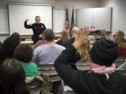 Vancouver Police Chief James McElvain speaks about recent officer-involved shootings during a Vancouver Neighborhood Alliance meeting Wednesday night at Fisher's Landing Fire Station 9.