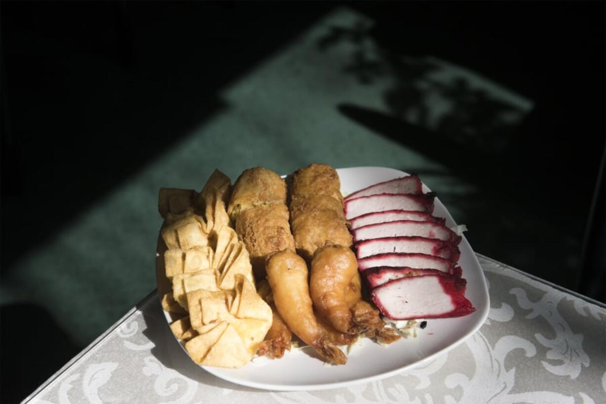 The house appetizer plate at Lucky House.