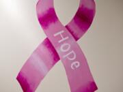 A pink ribbon created in support of breast cancer patients is seen in an operating room at Legacy Salmon Creek Medical Center.