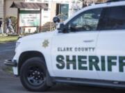 A Clark County sheriff’s deputy sits in his cruiser as worshippers walk into at Masjid Al Noor (Mosque of Light) at the Islamic Society of Southwest Washington in Hazel Dell on Friday.