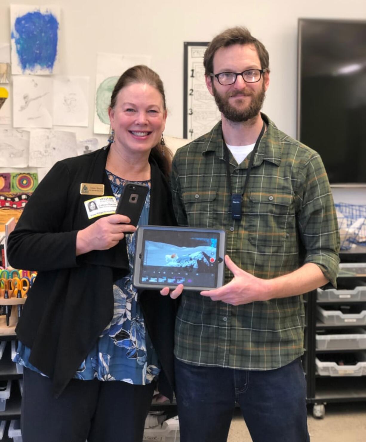 Ridgefield: Columbia Credit Union Chief Marketing Officer Colleen Boccia, left, and Alan Adams, an art teacher at Sunset Ridge Intermediate School. Boccia toured Adams’ classes after he received an Innovation Grant from the Ridgefield Public Schools Foundation, which was funded by Columbia Credit Union.