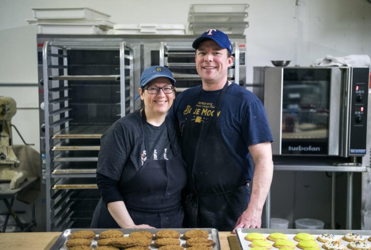 Co-owners Catherine Misener, left, and her husband Chris Misener are pictured at Deda’s Bakery north of Vancouver. Their workday starts at 4:30 a.m. — part of a 65-hour workweek.