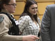 Tay'Lor Smith fights back tears as she is escorted out of the courtroom in handcuffs after being sentenced Wednesday afternoon at the Clark County Courthouse on Wednesday afternoon, March 27, 2019. Smith pleaded guilty for pushing Jordan Holgerson of Kalama off the bridge at Moulton Falls Regional Park in August. She was sentenced to two days in jail and 38 days on a county work crew.