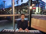 Mac Potts serenades diners in March 2018 at Nom Nom restaurant in downtown Vancouver.