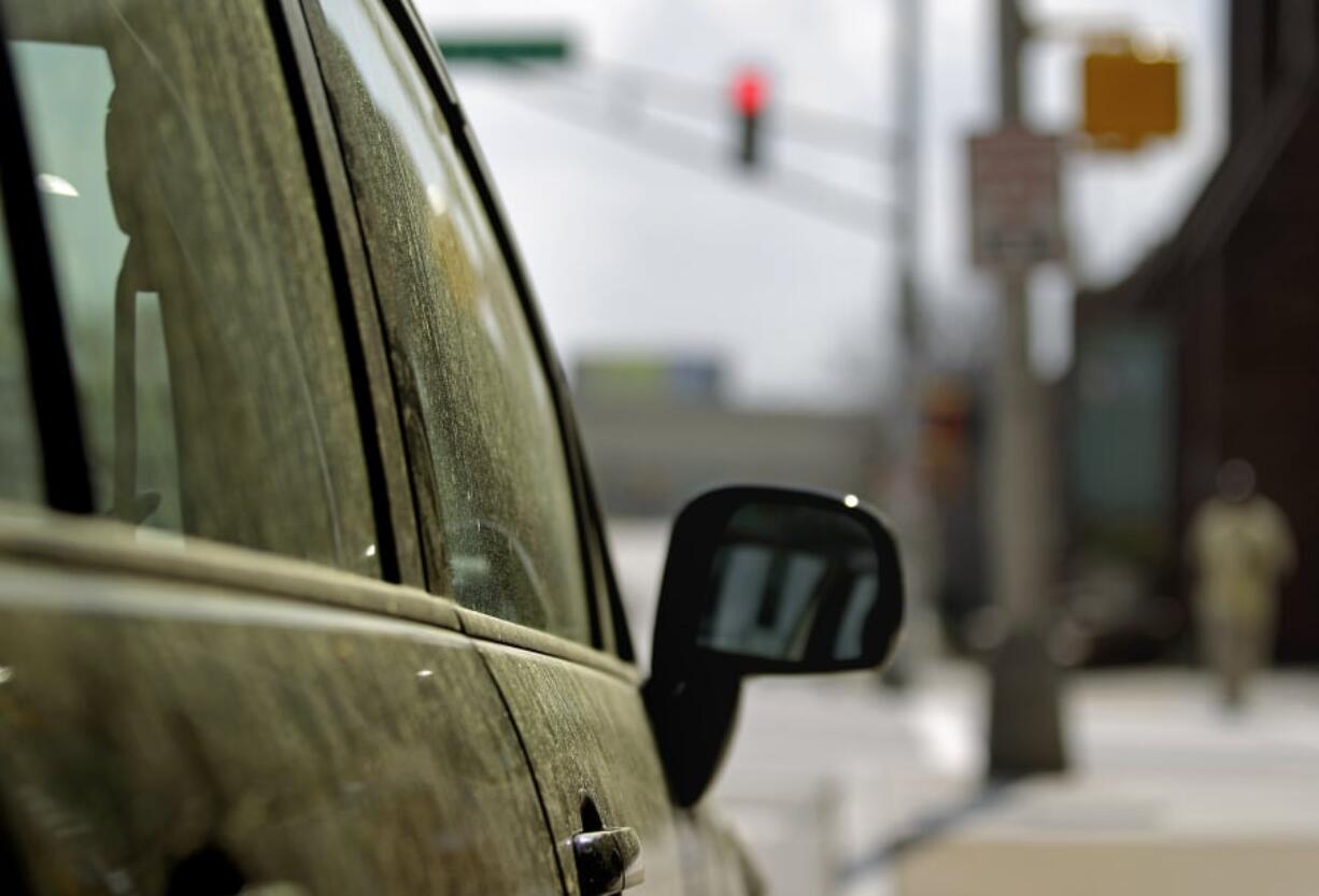 Pollen covers a car in Atlanta in 2012. Pollen season was slightly delayed in the Northwest this year because of the later cold weather, but tree pollen levels have been moderate to high in the last couple of weeks ever since temperatures warmed.