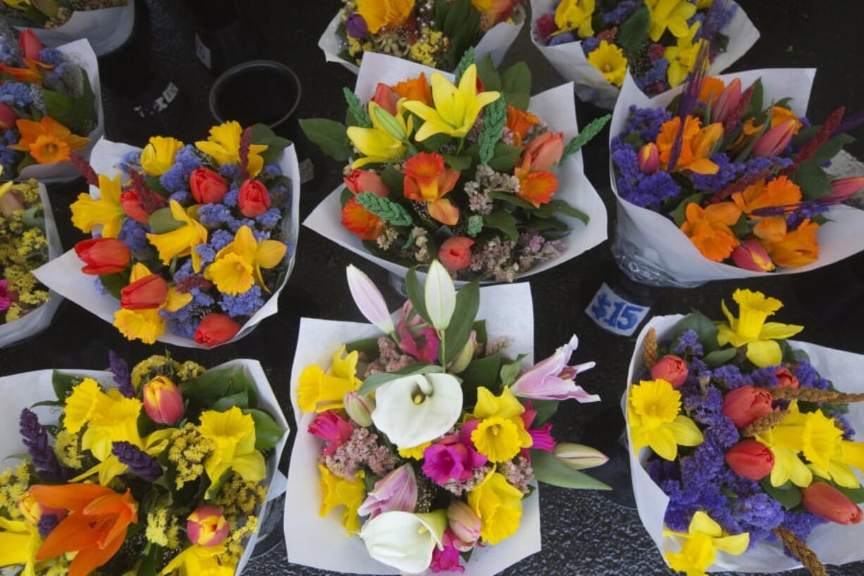 Fresh flowers for sale on the first day of the Vancouver Farmer’s Market in 2018.