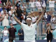 Roger Federer, of Switzerland, reacts after defeating John Isner in the singles final of the Miami Open tennis tournament, Sunday, March 31, 2019, in Miami Gardens, Fla.