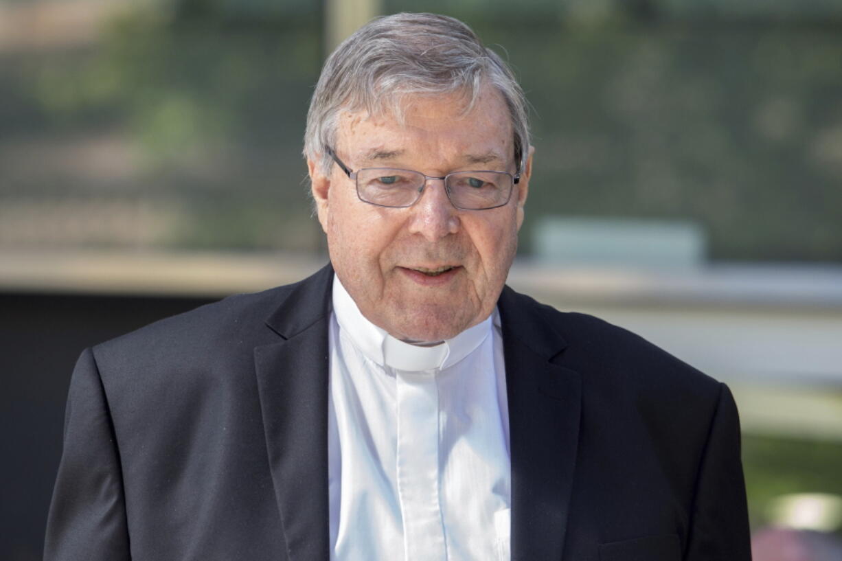 In this Dec 10, 2018, photo, Cardinal George Pell, the most senior Catholic cleric to face sex charges, departs an Australian court. Pell was sentenced in an Australian court on Wednesday, March 13, 2019 to 6 years in prison for molesting two choirboys in a Melbourne cathedral more than 20 years ago.