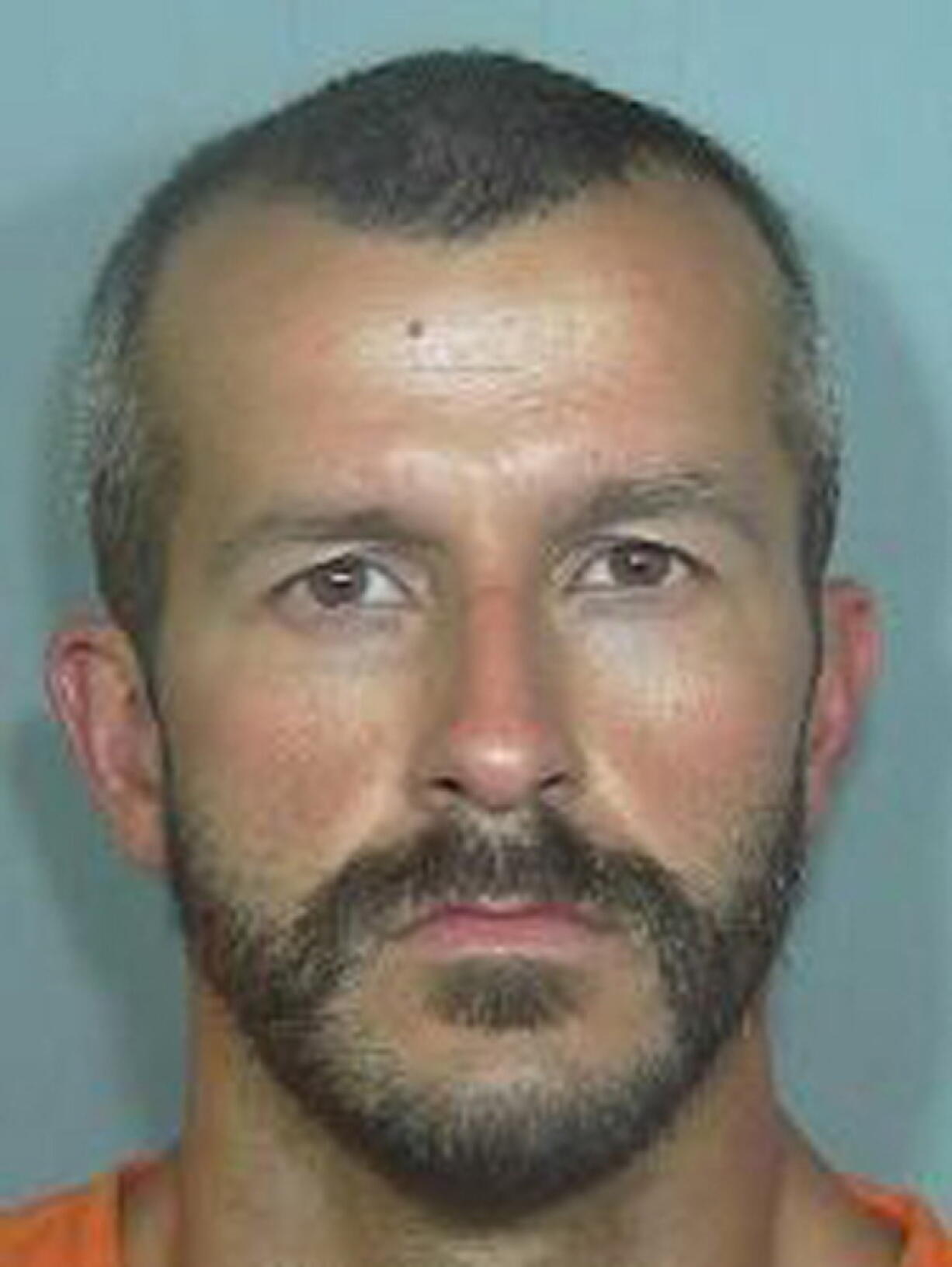 FILE - This undated file photo from the Weld County Sheriff’s Office shows Chris Watts, who pleaded guilty in the deaths of his pregnant wife, 34-year-old Shanann Watts, and their two daughters, 4-year-old Bella and 3-year-old Celeste. Lawyers representing Shannan Watts’ parents say he killed her after she threatened to keep him from seeing their children because he wanted a divorce.