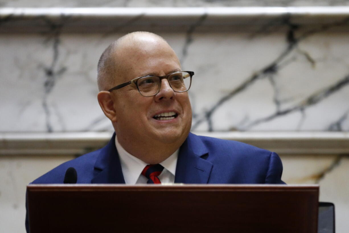 FILE - In this Jan. 30, 2019 photo, Gov. Larry Hogan delivers his annual State of the State address to a joint session of the legislature in Annapolis, Md. Hogan will speak in New Hampshire next month as he weighs a primary challenge to President Donald Trump.