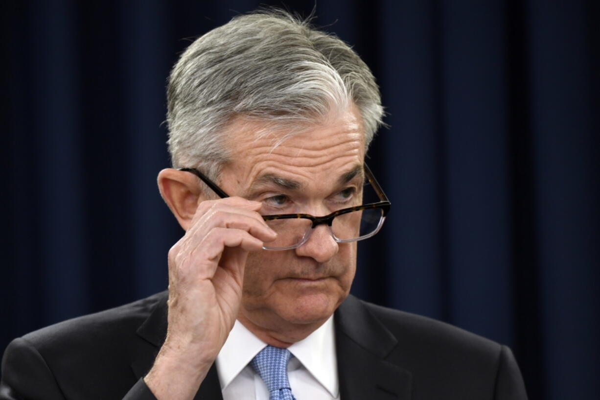 Federal Reserve Chair Jerome Powell listens to a reporter’s question during a news conference in Washington, Wednesday, March 20, 2019.