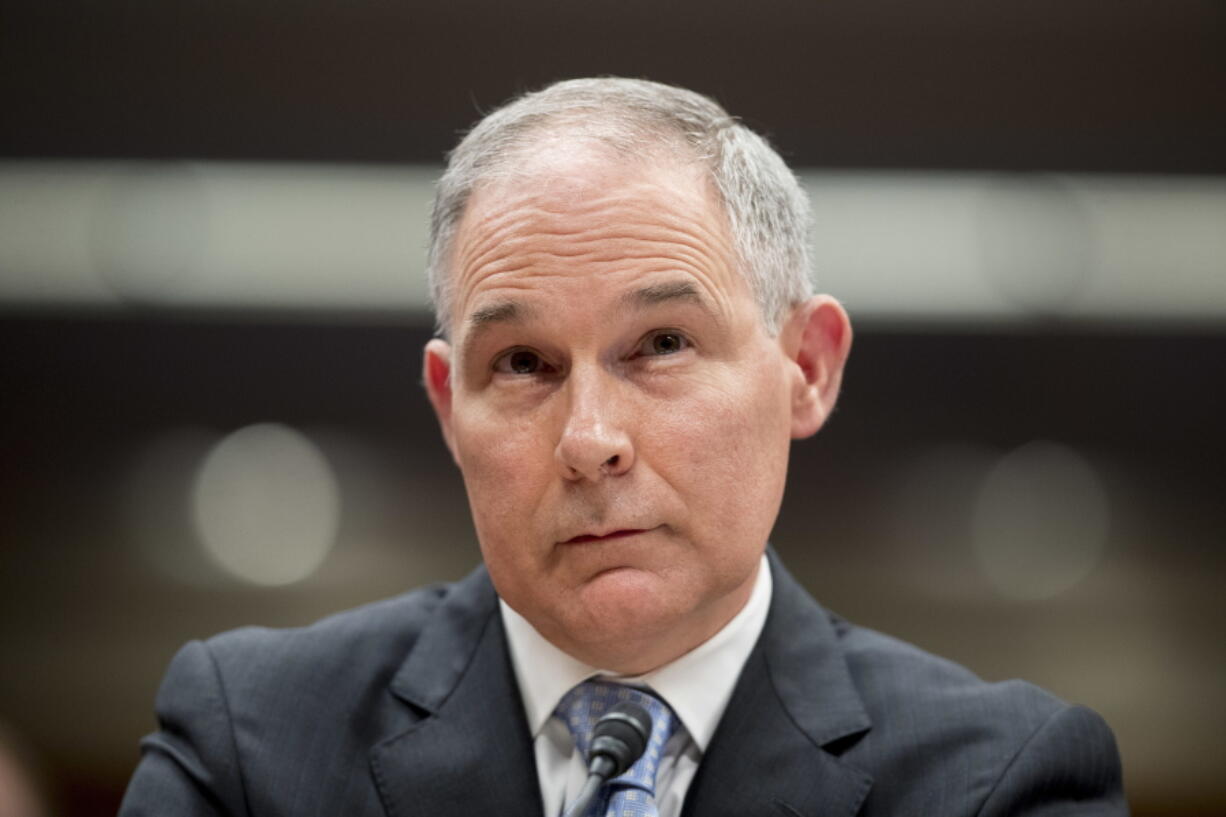 FILE - In this May 16, 2018 file photo, Environmental Protection Agency Administrator Scott Pruitt appears before a Senate Appropriations subcommittee on the Interior, Environment, and Related Agencies on budget on Capitol Hill in Washington. Federal ethics officials are balking at a $50-a-night condo deal by former Environmental Protection Agency chief Scott Pruitt. The federal Office of Government Ethics said in a finding posted Tuesday that it would not approve one of Pruitt’s last financial disclosure reports after his resignation amid ethics scandals last July. Pruitt rented a condo from the wife of a lobbyist for a bargain rate of $50 a night. Pruitt insisted it was a proper business arrangement. Critics called it an improper gift linked to a lobbyist who did business before the EPA.