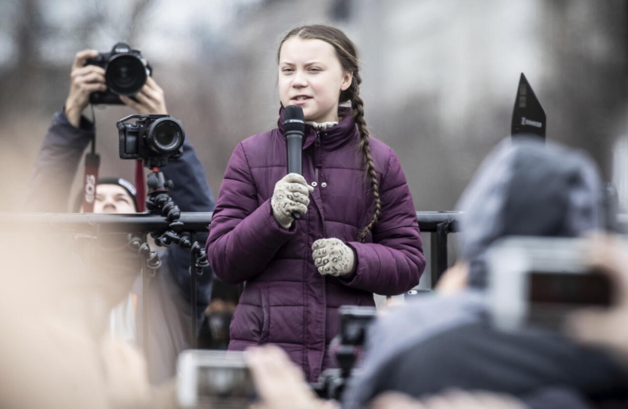 Swedish climate activist Greta Thunberg attends the ‘Friday For Future’ rally in Berlin, Germany, Friday, March 29, 2019. Thousands of students are gathering in the German capital, skipping school to take part in a rally demanding action against climate change.