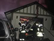 Fire damaged this detached garage at a Lincoln neighborhood home Thursday after midnight, according to the Vancouver Fire Department. The cause of the fire is under investigation.