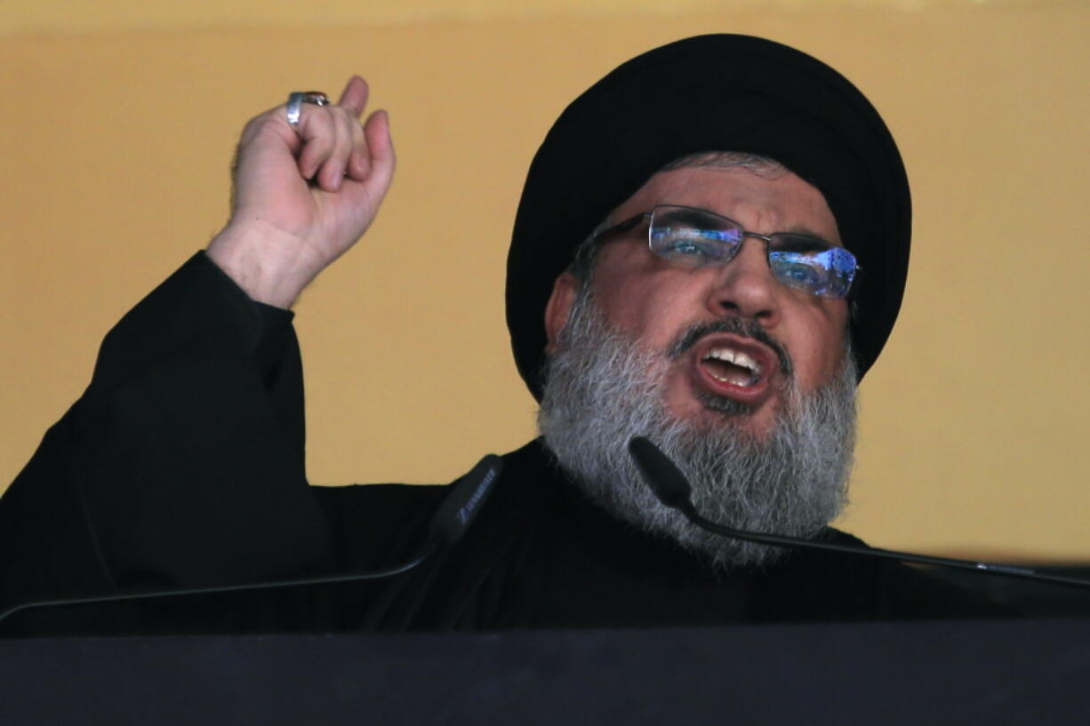 FILE - In this Oct. 24, 2015 file photo, Hezbollah leader Sheik Hassan Nasrallah addresses a crowd during the holy day of Ashoura, in a southern suburb of Beirut, Lebanon. U.S. Secretary of State Mike Pompeo’s visit to Lebanon this week is expected to underscore the Trump administration’s displeasure with Hezbollah’s growing influence in Lebanese politics. The Iranian-backed group wields more power than ever in the country’s Cabinet and parliament.