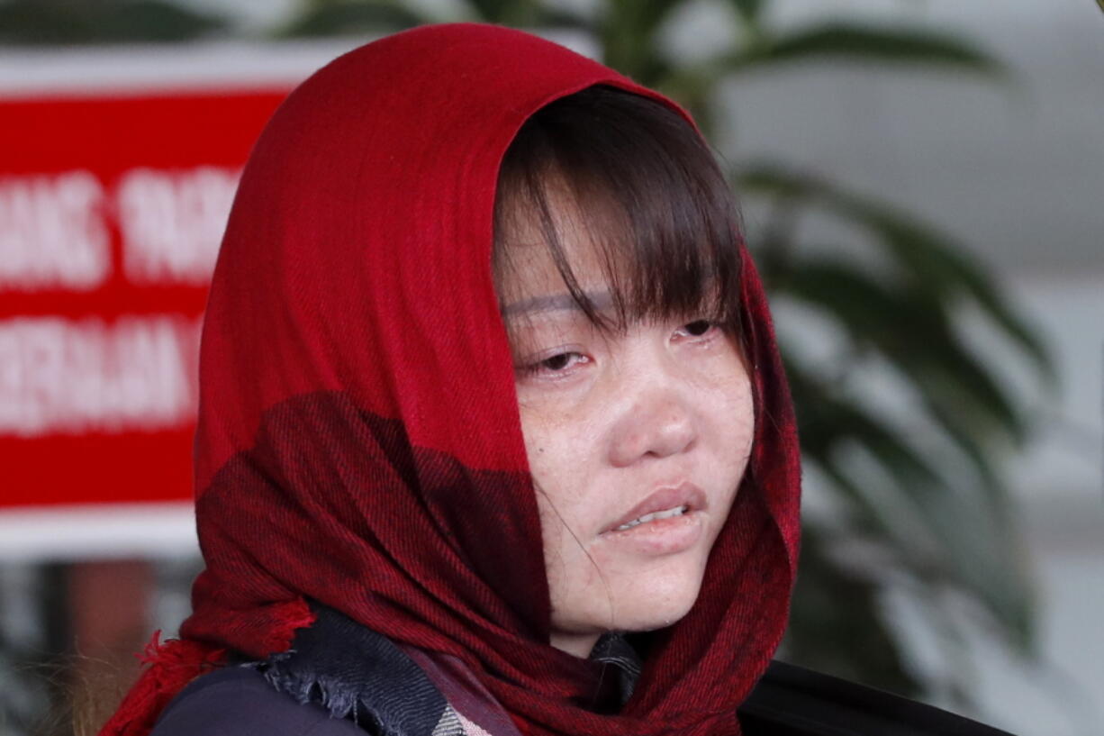 Vietnamese Doan Thi Huong is escorted by police as she leaves Shah Alam High Court in Shah Alam, Malaysia, Thursday, March 14, 2019. Malaysia’s attorney general ordered the murder case to proceed against the Vietnamese woman accused in the killing of the North Korean leader’s estranged half brother, prosecutors said in court Thursday.