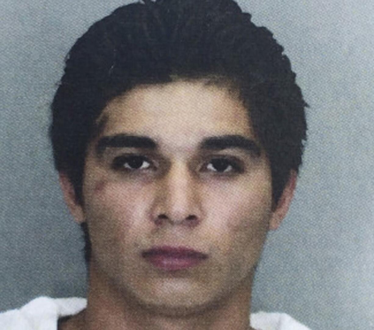 FILE - This file photo provided by the Fairfax County Police Department shows Darwin Martinez-Torres, of Sterling, Va. Martinez-Torres is expected to receive a life sentence for raping and killing a Muslim teenager as she walked back to a mosque with friends for religious services.