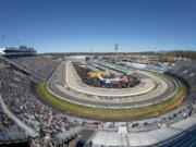 Fans enjoy the NASCAR Truck Series race at Martinsville Speedway in Martinsville, Va. Saturday, March 23.