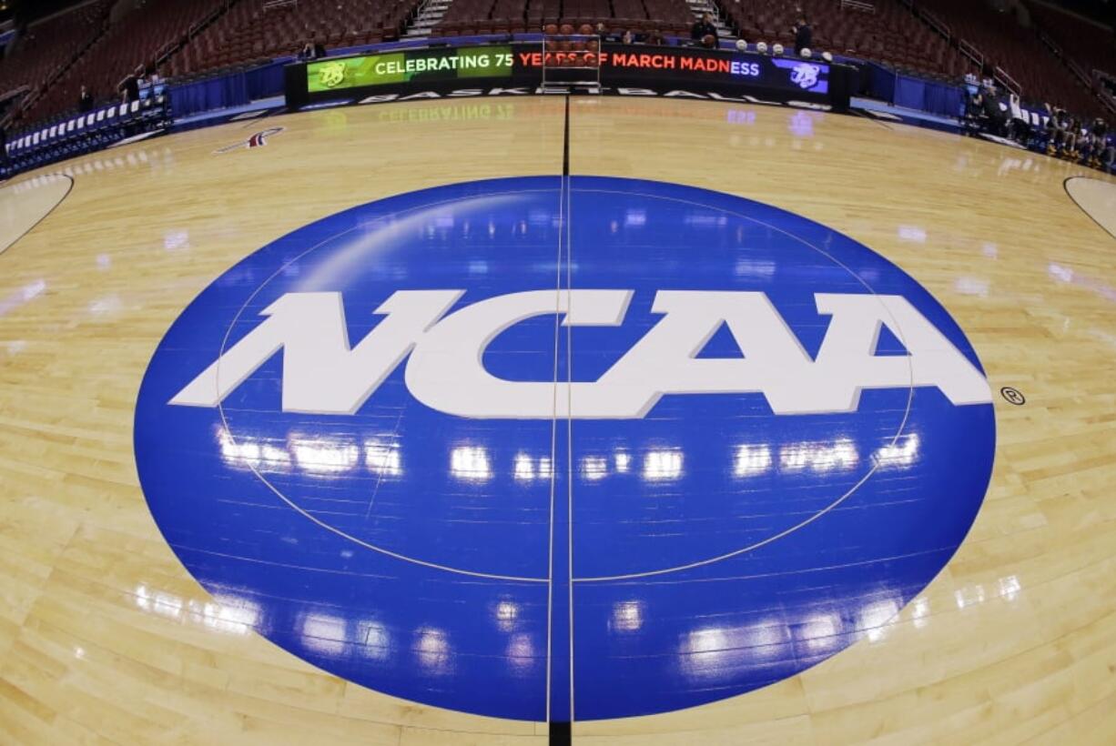 A judge has ruled against the NCAA in a federal antitrust lawsuit, saying football and basketball players should be permitted to receive more compensation from schools but only if the benefits are tied to education.