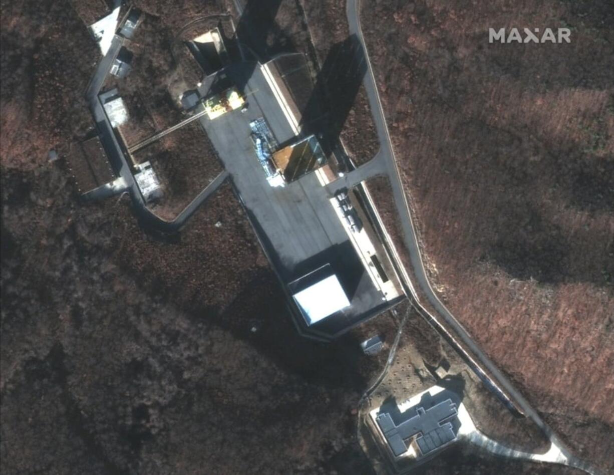 CORRECTS DATE OF IMAGE TO DEC. 5, 2018 - This Dec. 5, 2018 image provided by DigitalGlobe provided on Tuesday, March 5, 2019 shows a satellite image of North Korea’s Sohae facility. Satellite imagery showing new activity at a North Korean rocket launch site has raised doubt that Kim Jong Un will ever give up his nuclear weapons. U.S.-North Korea talks are continuing and President Donald Trump is still hoping to get a deal despite the failure of the two leaders’ second summit. Trump said Wednesday that he’d be unhappy if reports were true that Kim was rebuilding a launch site after promising in Vietnam to extend his current ban on nuclear and rocket tests.