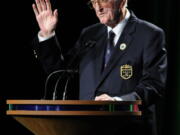 FILE - In this May 7, 2012, file photo, sports writer Dan Jenkins speaks after receiving the lifetime achievement award during the World Golf Hall of Fame inductions at World Golf Village in St. Augustine, Fla. Jenkins, the sports writing great and best-selling author known for his humor, has died. He was 89. TCU athletic director Jeremiah Donati confirmed Jenkins died Thursday, March 7, 2019, in his hometown of Fort Worth, Texas.