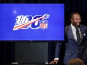 Arizona Cardinals’ Larry Fitzgerald listens during a news conference on social justice during the annual NFL football owners meetings, Monday, March 25, 2019, in Phoenix.