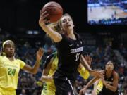 Stanford’s Alanna Smith (11) grabs a rebound against Oregon during the first half of an NCAA college basketball game in the final of the Pac-12 women’s tournament Sunday, March 10, 2019, in Las Vegas.