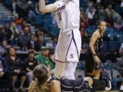 Stanford’s Alanna Smith drives into Washington’s Amber Melgoza during the second half of an NCAA college basketball game in the semifinals of the Pac-12 women’s tournament Saturday, March 9, 2019, in Las Vegas.