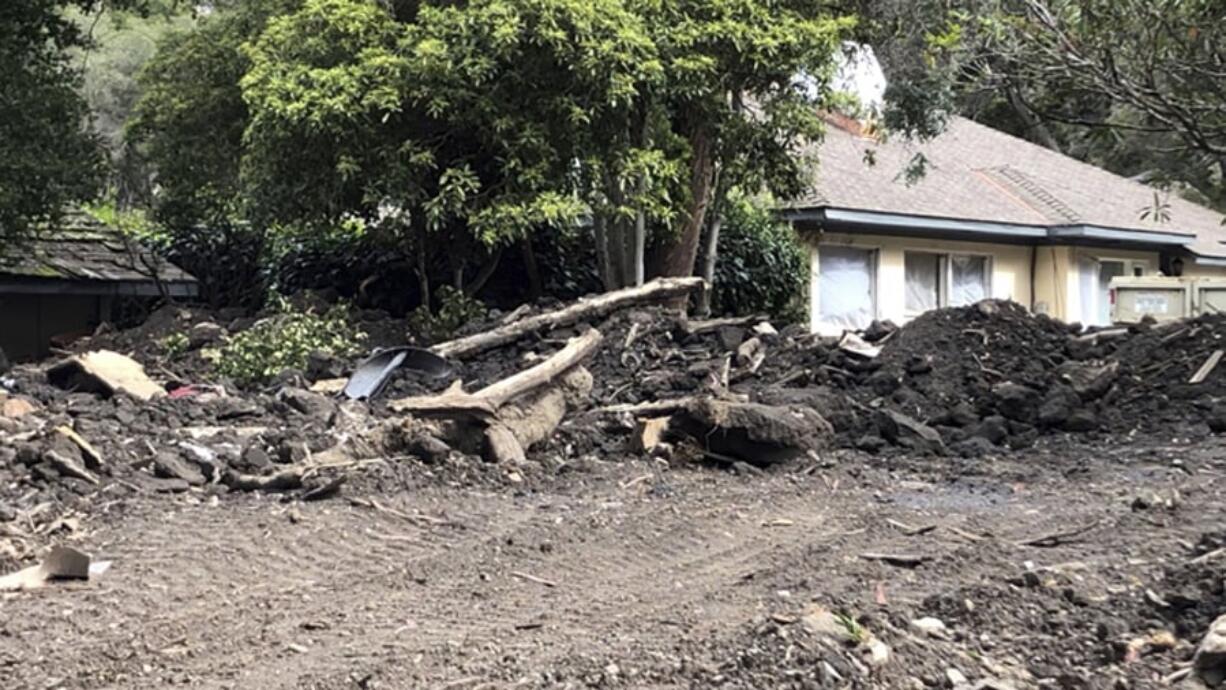 This photo provided by KEYT-TV shows a damaged home Tuesday, March 5, 2019, more than a year after devastating floods hit this Montecito, Calif., neighborhood. The Santa Barbara County Sheriff’s Office on Tuesday ordered about 3,000 residents to evacuate ahead of a new storm expected to hit areas scarred by wildfires, including parts of Montecito hit by a disastrous debris flow just over a year ago. Residents of risk areas below the Thomas, Whittier and Sherpa fire burn scars were told to leave their homes by 4 p.m.