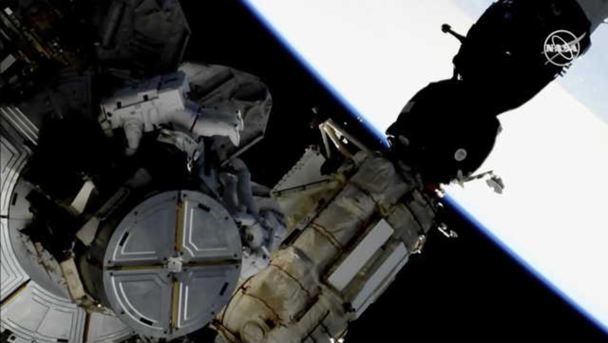 This image provided by NASA shows astronauts Anne McClain and Nick Hague taking a spacewalk to replace aging batteries on the International Space Station on Friday, March 22, 2019. Friday’s spacewalk is the first of three planned excursions to replace batteries and perform other maintenance.