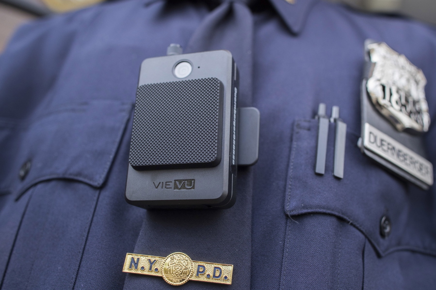 A police officer wears a newly-issued body camera outside in New York in 2017. Law enforcement and justice officials met last week to discuss the implementation of body-worn cameras in Clark County, and all agreed that now is the time to act.