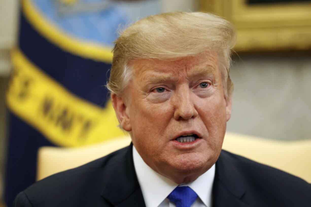 President Donald Trump speaks Wednesday in the Oval Office of the White House in Washington. The federal budget deficit is ballooning on Trump’s watch and few in Washington seem to care.