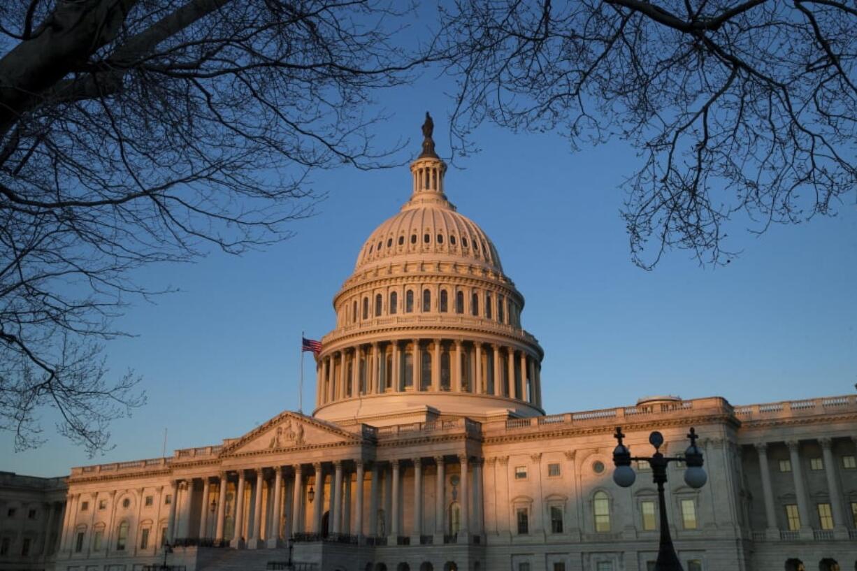 The U.S. Capitol is seen at sunrise, Saturday, March 23, 2019, in Washington. Special counsel Robert Mueller closed his long and contentious Russia investigation with no new charges, ending the probe that has cast a dark shadow over Donald Trump's presidency.