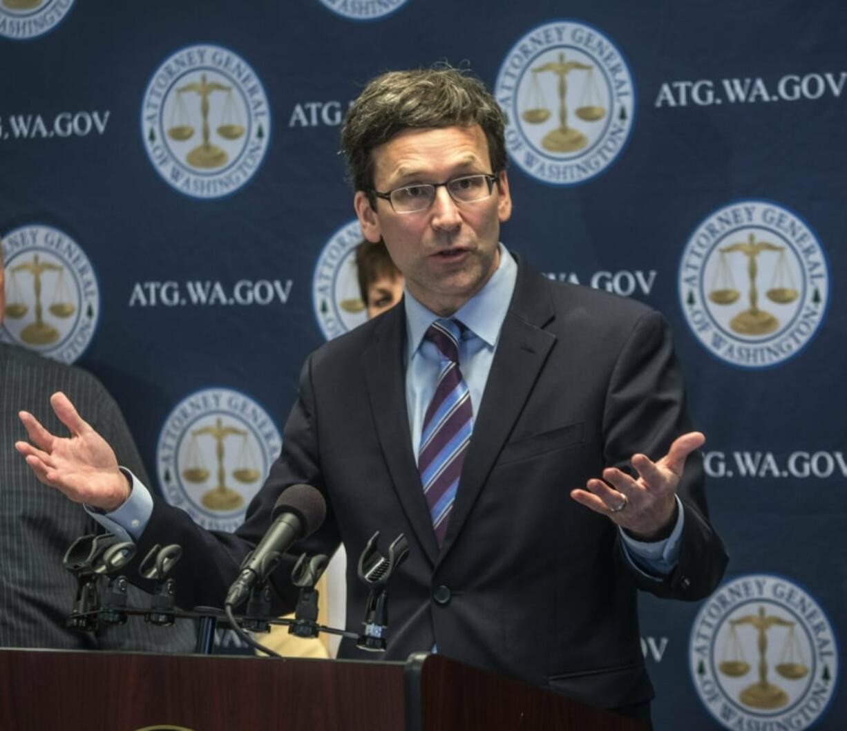 Washington Attorney General Bob Ferguson announces a major lawsuit against drug distributors related to Washington's opioid epidemic, Tuesday, March 12 2019 in Seattle.