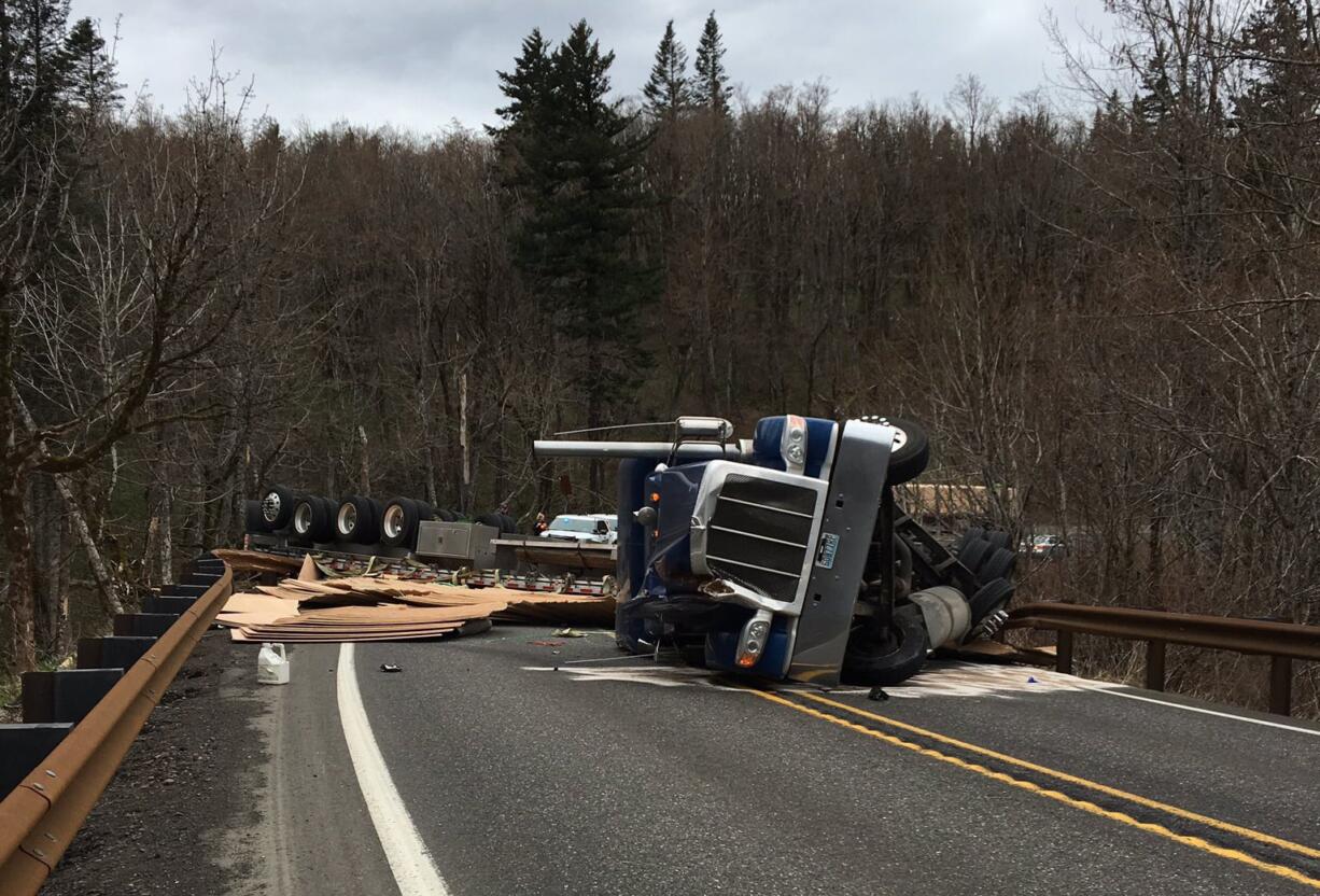 State Highway 14 at milepost 23 was closed Wednesday due to a semi rollover. The semi lost its load of plywood and blocked all lanes of traffic, according to WSP.