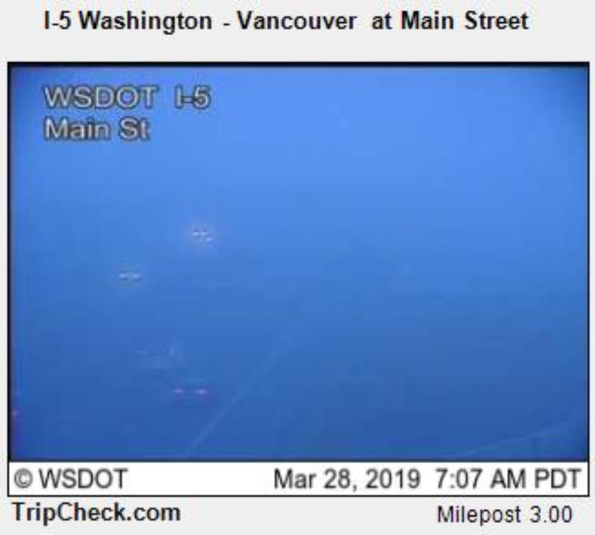 A Washington State Department of Transportation traffic camera shows dense fog Thursday morning in the area of Interstate 5 and Main Street.