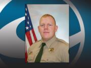 Cowlitz County Sheriff's Deputy Justin DeRosier was shot and killed  April 13 while contacting a disabled vehicle.