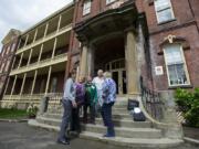 Class of 1965 alumni Pat Emrich, from left, Luci DeZort, Katy Hudert, Mary Parmantier and Connie Grenz reminisce about their school days outside the Providence Academy. It opened in 1857, and the last year that students graduated from the academy was 1966.