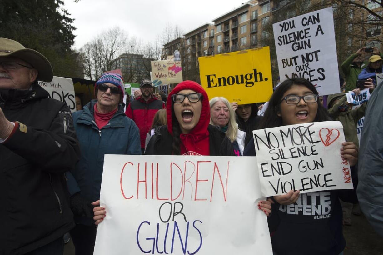 Lindsey Luis, at center, marches at the 2018 March for Our Lives, a nationwide string of student-led demonstrations following the death of 17 students and staff members at Marjory Stoneman Douglas High School in Parkland, Fla.